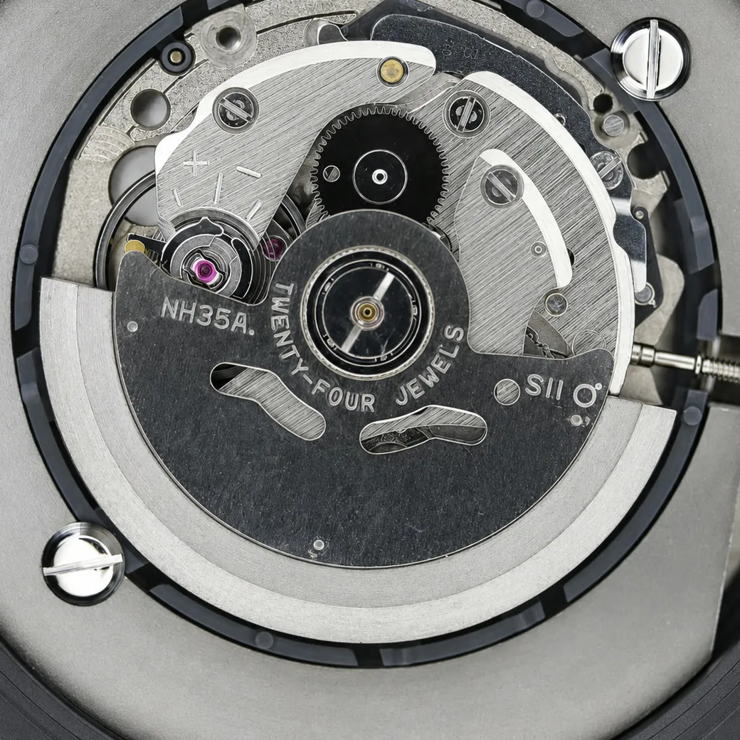 Rotor side of a Seiko NH35A movement, engraved NH35A, TWENTY-FOUR JEWELS and SII, with the balance and Magic Lever winding visible.